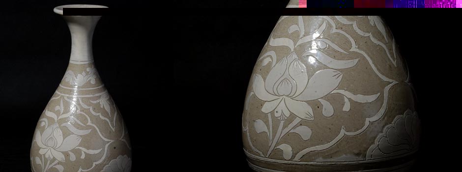 Spring jade pot with white-glazed inscribed flower painting by Cizhou Kiln in Song Dynasty. H:31.5cm 